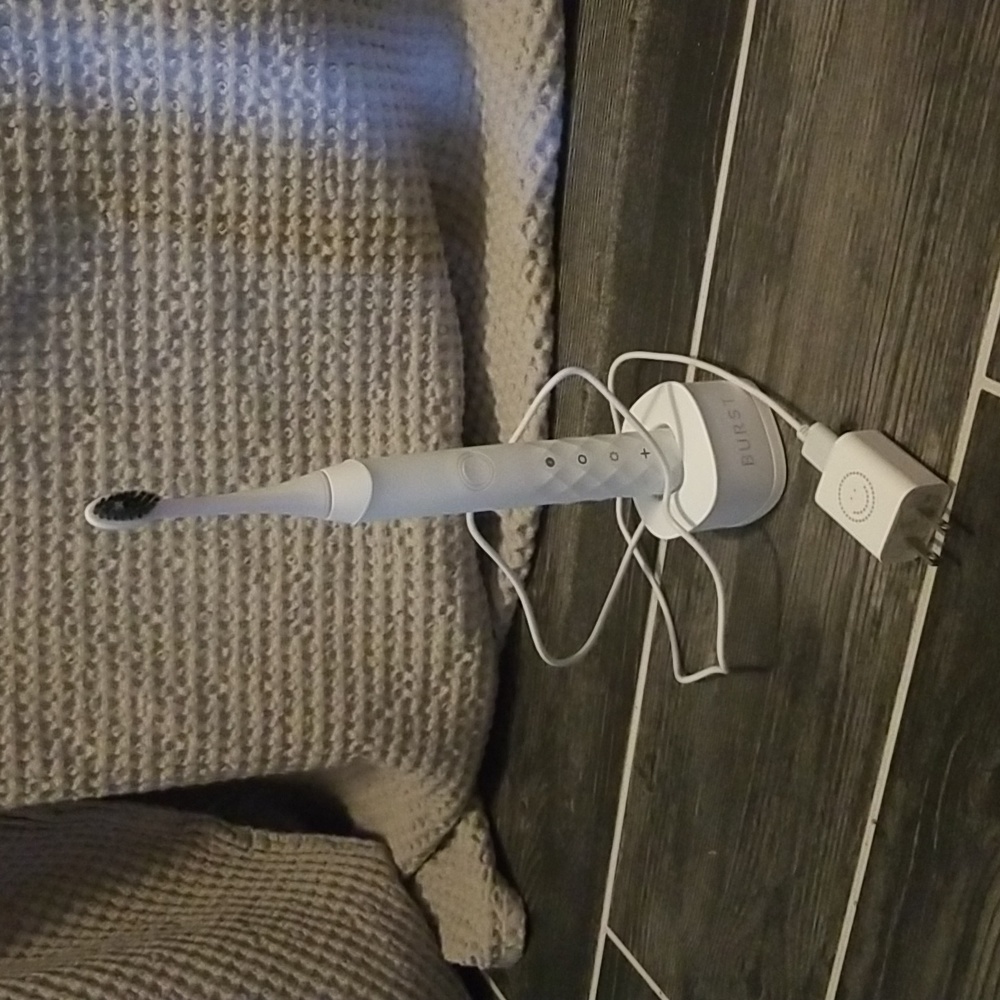 Burst Sonic electric toothbrush. White. Used once. Selling without the brushhead